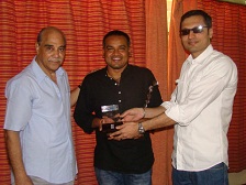 Mr Nilmadhab Panda ,Director,being handed over the awards in India by Mr Manav Jalan on behalf of CIFFC for the film I am Kalam which won accolades in 2012 in Cairo